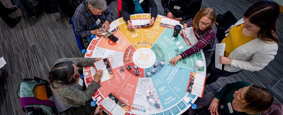 A group of people engaged sitting in a circle