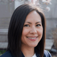 Headshot of a woman smiling.